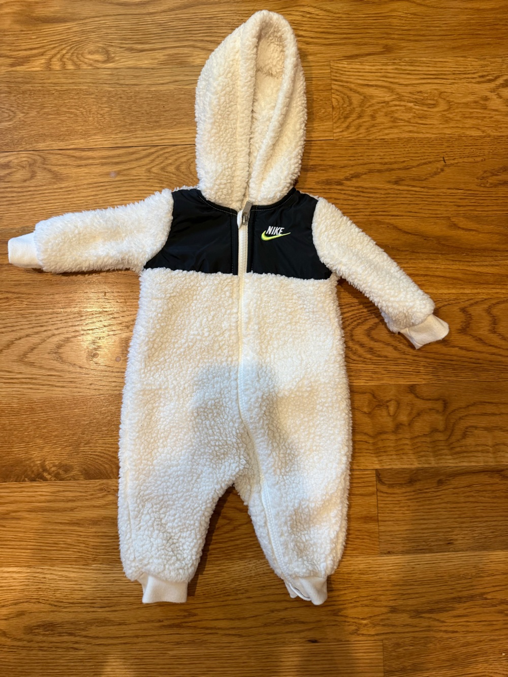 Nike White Sherpa Kids One-Piece with Black Chest Panel and Neon Swoosh